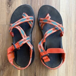 Women’s size 9 orange Chaco sandals with toe strap